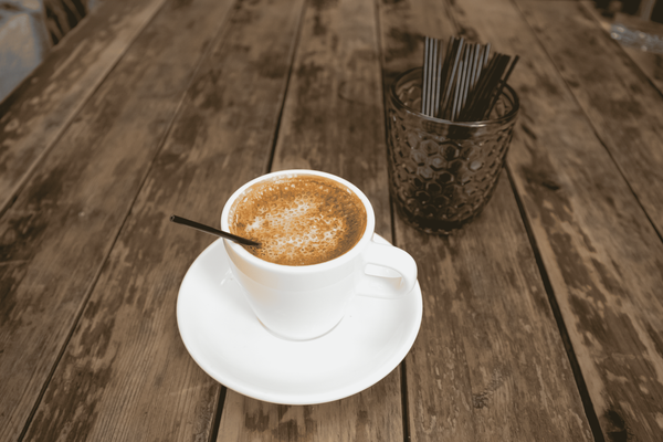 Black Stir Stick in Coffee